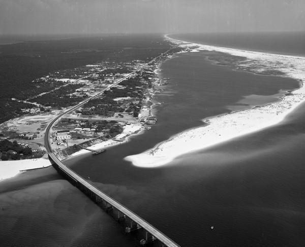 The East Pass Bridge and US 98 from the air, 1959